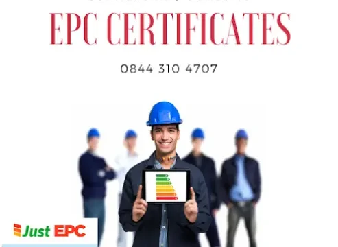 Energy assessor holding an EPC rating chart for domestic and commercial properties in Manchester